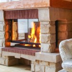 Рустикальний камін в дерев'яному зрубі